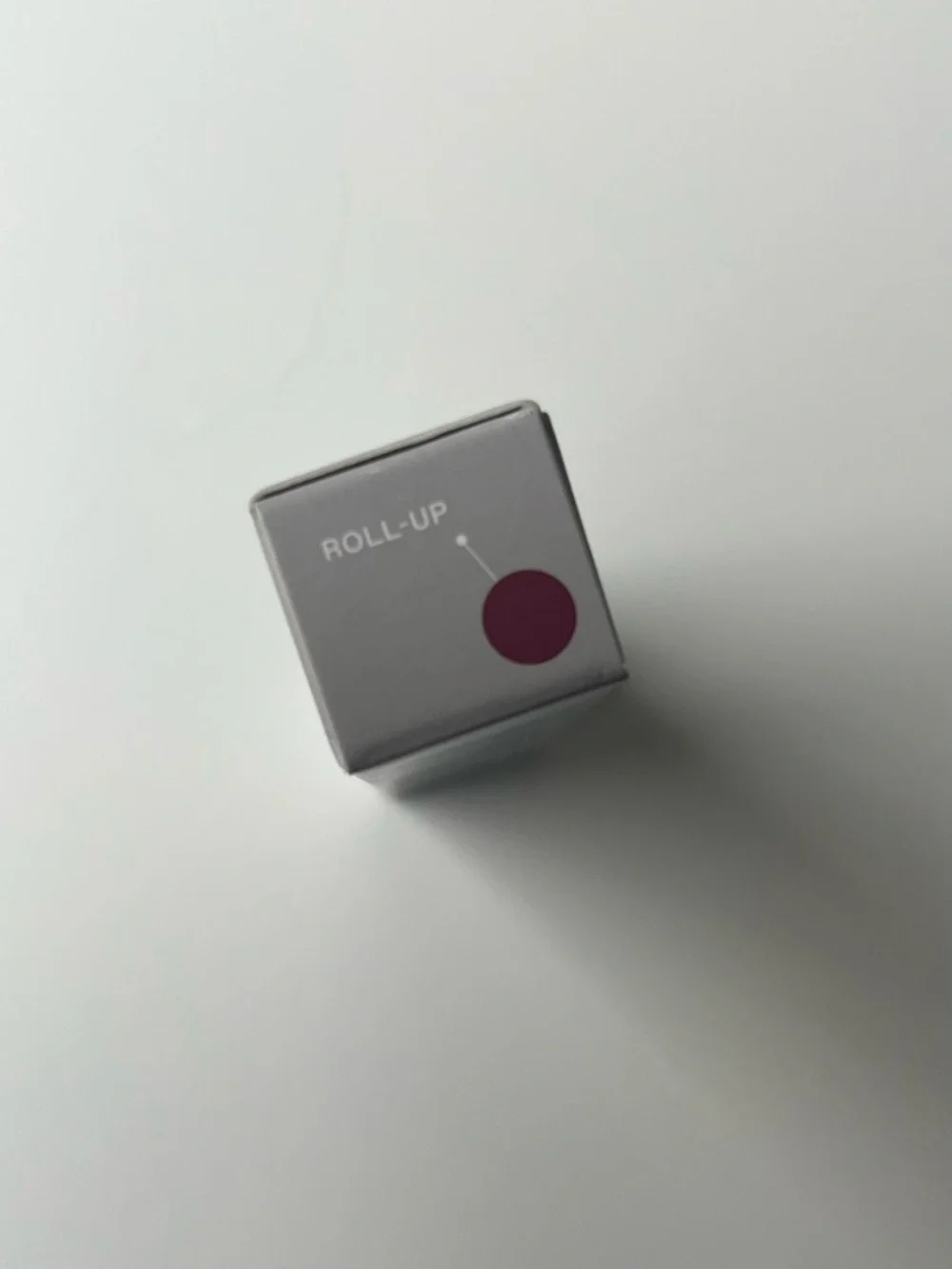 r.e.m. beauty by Ariana Grande, On Your Collar Plumping Lip Gloss “Rollup” Shade
